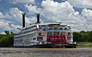 Large boat red chairs deck - river free wallpaper