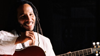Man dreadlocks guitar smiling camera - black arts movement free wallpaper