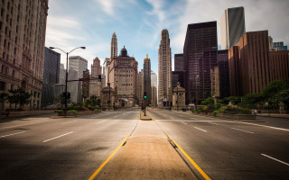 City street person walking sidewalk - tall building free wallpaper