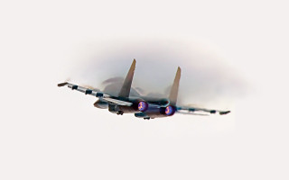 Jet plane flying sky white - chromatic aberration free wallpaper