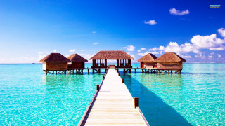 Pier huts ocean clear blue 2 - clear blue water free wallpaper