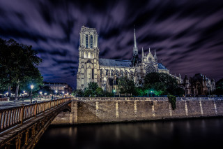 Cathedral night bridge river illuminated - a large cathedral free wallpaper
