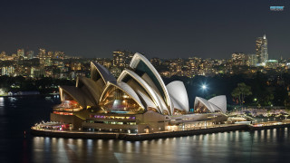 Large building night lights city - architecture free wallpaper