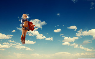 Woman flying bikini red cape 2 - a red cape free wallpaper
