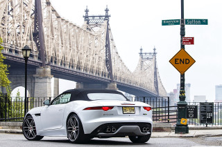 White sports car driving street - xf iq4 free wallpaper