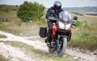 Man motorcycle dirt road countryside - colin moss free wallpaper
