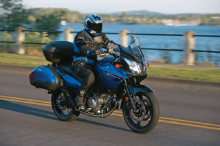 Man riding blue motorcycle lake - a blue motorcycle free wallpaper