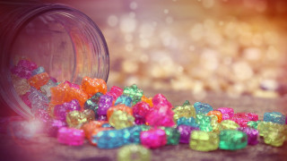 Colorful gummy bears jar table - a jar free wallpaper