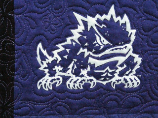 Quilted dragon wall hanging close - sharp high detail free wallpaper