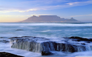 Mountain lake waterfall sky beach - a large body of water free wallpaper