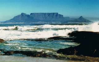 Rocky beach waves mountain water - a rocky beach free wallpaper