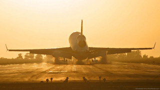 Jetliner airport runway sunset people 2 - top of an airport runway free wallpaper