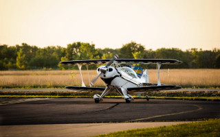 Small plane runway grass trees - a yellow sky free wallpaper