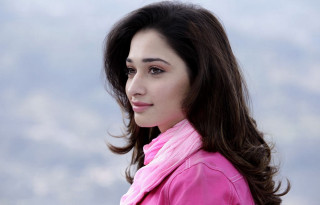 Woman pink jacket posing sky - movie still frame free wallpaper