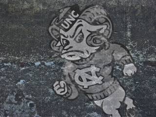 Football player running with ball - his hand and a helmet free wallpaper