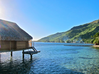 Dock thatched roof mountain water - a dock free wallpaper