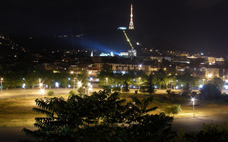 City night tower lit trees - edi rama free wallpaper