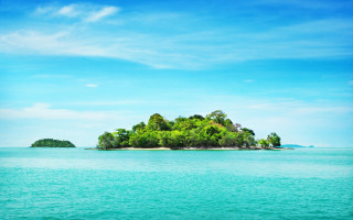 Small island ocean trees boat 2 - side and a boat free wallpaper