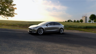 Silver car driving road grass 2 - a silver car free wallpaper