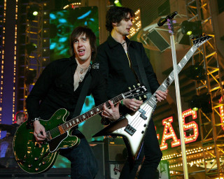 Two men playing guitars on 6 - the other free wallpaper