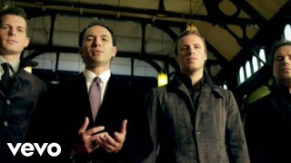 Men group standing building clock 4 - the wall behind them free wallpaper