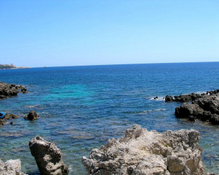 Rocky beach water blue sky - cagnaccio di san pietro free wallpaper