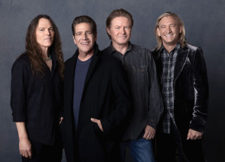 Group people standing gray black - eric taylor free wallpaper