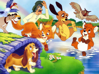 Cartoon dogs lush green field - don bluth free wallpaper