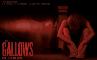 Woman sitting dark room crossed 2 - bill lewis free wallpaper