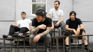 Men bench sitting sidewalk building - adam rex free wallpaper