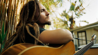 Man dreadlocks hammock guitar looking - a hammock free wallpaper
