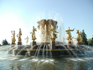 Fountain statues trees blue sky - sculpture free wallpaper