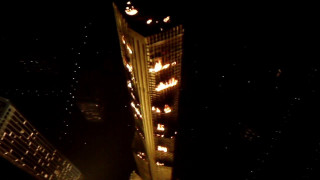 Tall building night lights bright - hypermodernism free wallpaper