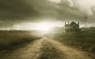 Dirt road house hill cloudy - a windmill in the distance free wallpaper
