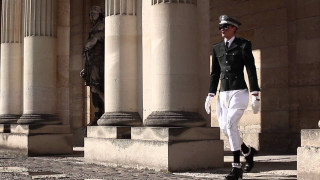 Man uniform walking street columns - column free wallpaper