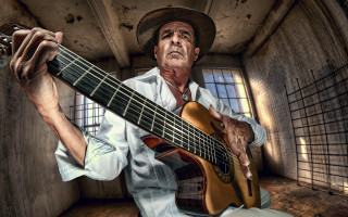Man holding guitar room window - a guitar in a room free wallpaper