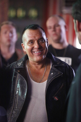 Man smiling blackjacket cosplay photorealistic - derold page free wallpaper