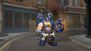 Man blue yellow outfit gun - his hand in free wallpaper