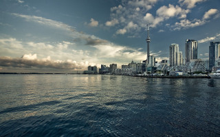 City skyline water cloudy sky 7 - a cloudy sky above free wallpaper