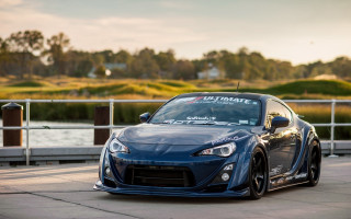 Blue sports car road fence 2 - anthony s waters free wallpaper