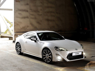 White sports car parking lot 9 - a large window free wallpaper