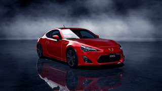Red sports car fog backlit - realistic free wallpaper