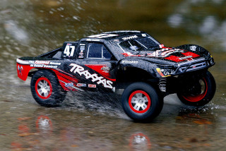 Truck driving puddle wet road - a wet road free wallpaper