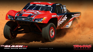 Red truck driving dirt desert - a red truck free wallpaper