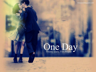 Couple kissing street one day - a photo free wallpaper