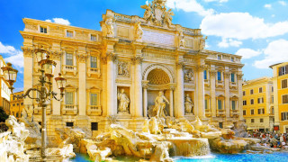 Large building fountain people blue - it in front free wallpaper