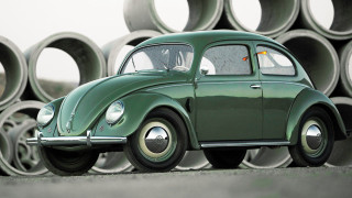 Green car pipe pile building - the ground in front free wallpaper