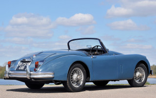 Blue sports car lake road - a blue sports car free wallpaper for desktop