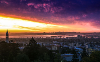 Sunset city water mountain view - a large body of water free wallpaper