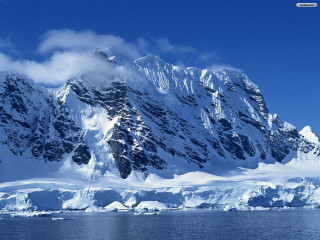 Snowy mountain water clouds boat - a large mountain free wallpaper